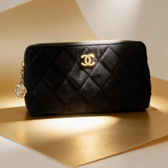 CHANEL Black Quilted Clutch with Gold Logo - Picture 2 of 4